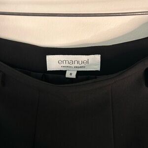 Pleaded black mini skirt